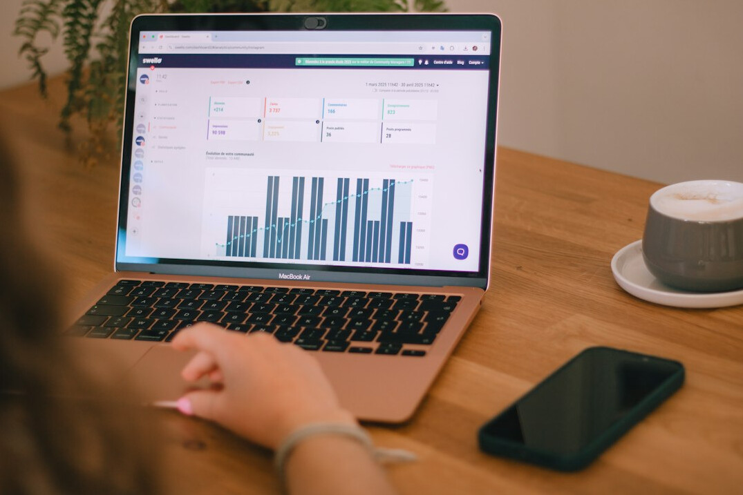 person reviewing budget on laptop