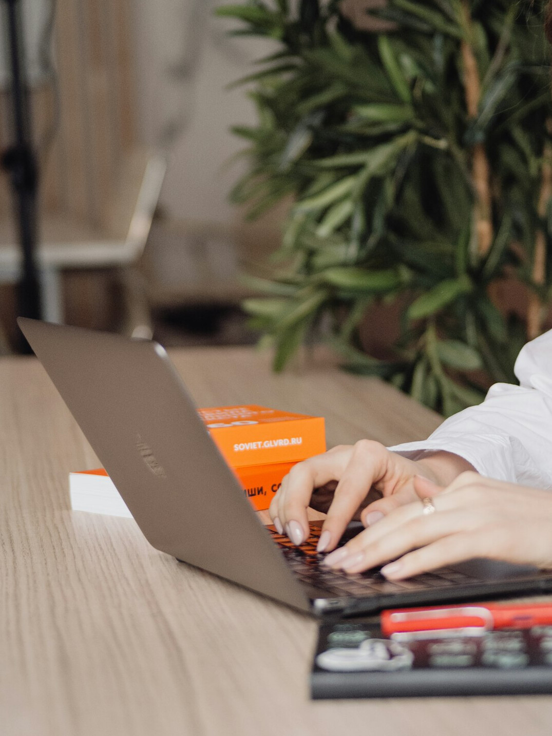 person budgeting on laptop
